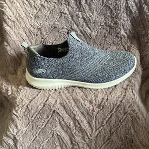 Sketchers air cooled memory foam stretch fit sneakers.